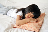 Kid sleeping on Toddler pillow