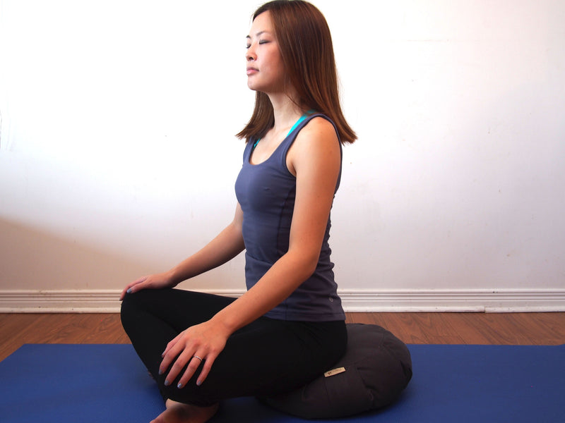 Meditating on Zafu Meditation Cushion